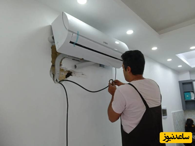 خلاقیت مشاغل؛ ابتکار کمرشکن و خنده‌دار نصاب کولرگازی در هدایت باد کولر بین پذیرایی و اتاق منزل مشتری+ ویدیو/ مغز نصابو باید قاب کرد زد به دیوار!😂